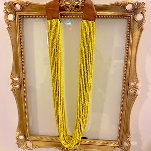 Handmade in South Africa. Beaded necklace with genuine leather detail.